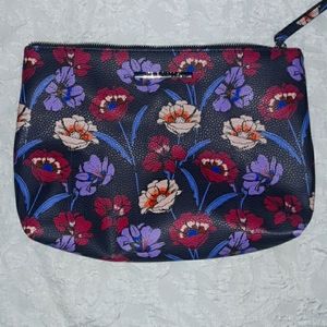 Steve Madden floral cosmetic clutch